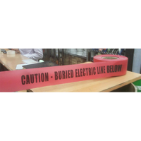 uae/images/productimages/gulf-safety-equip-trdg-llc/caution-tape/warning-tape-caution-buried-electric-line-below-3-x-250mtr.webp