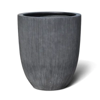 uae/images/productimages/royal-garden-centre/garden-pot/tall-egg-fiberglass-pot-vertical-striped-trend-black-eb0540751-3-kg.webp