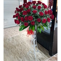 uae/images/productimages/sonya-plants-and-flowers-llc/flower-stand/red-roses-grand-opening-flower-stand.webp