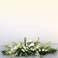 uae/images/productimages/sonya-plants-and-flowers-llc/memorial-flower/sympathy-and-funerals-long-and-low-flower-arrangement.webp