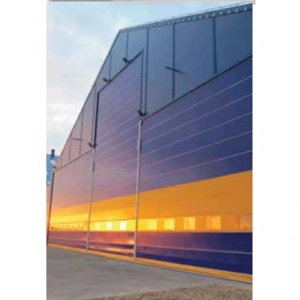 uae/images/productimages/hmi-building-materials-trading-llc/automatic-door-operator/fabric-type-mega-fold-up-hangar-door.webp